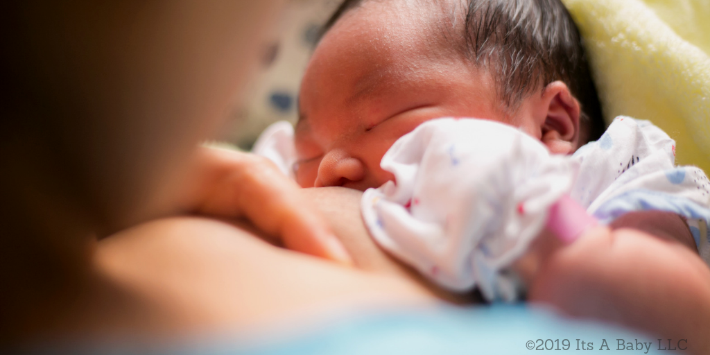 baby breastfeeding for the first time